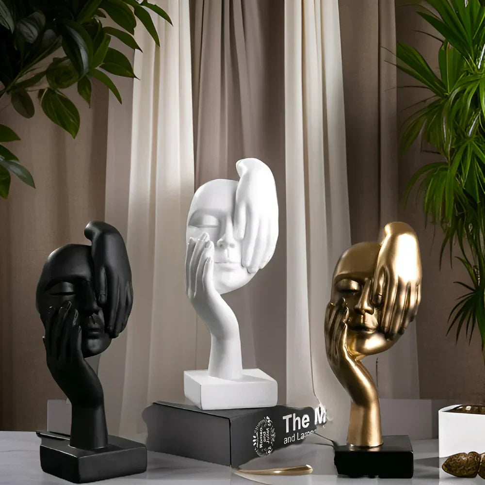 Abstract face sculpture in resin shown on display