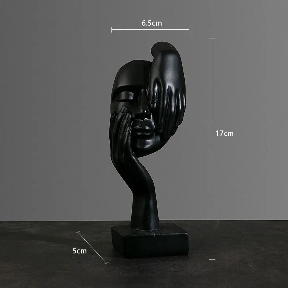 Abstract face sculpture in resin shown from the side