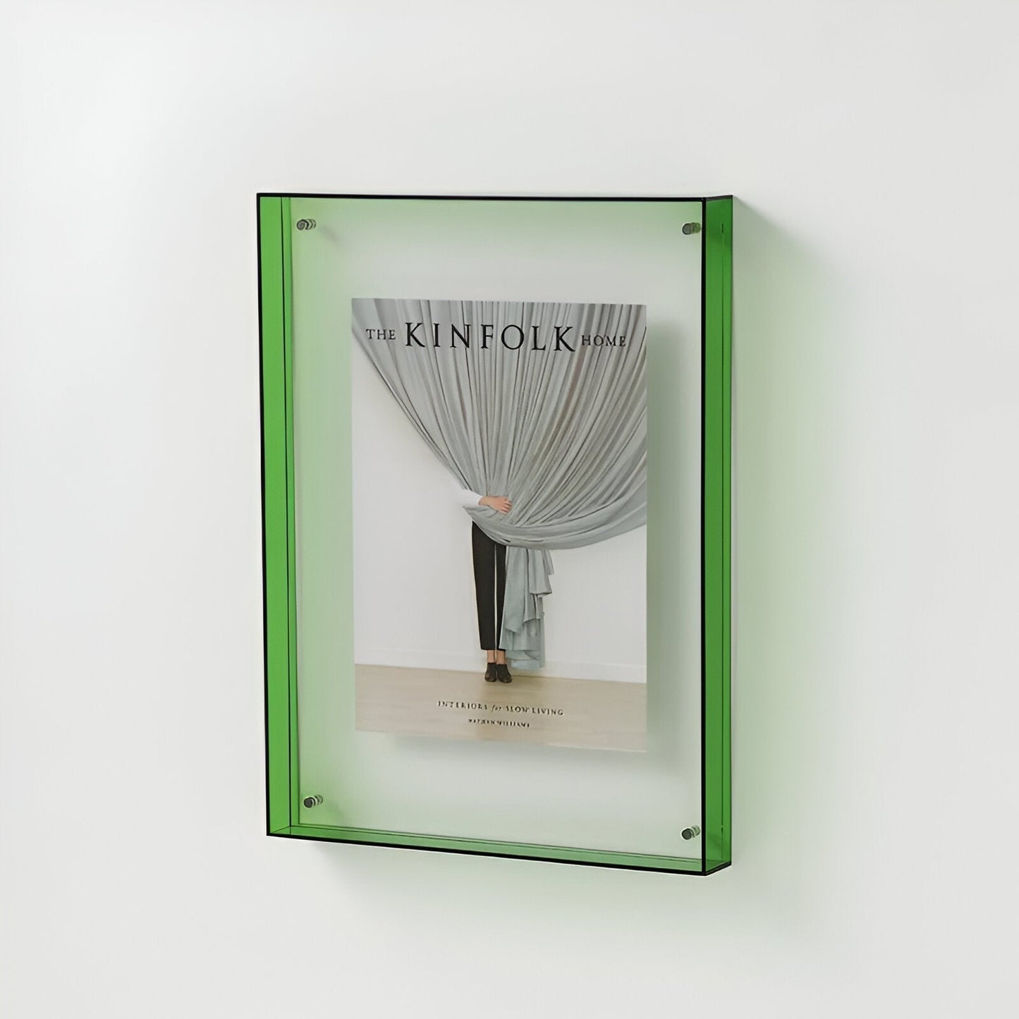 Clear acrylic floating picture frame in a home setting