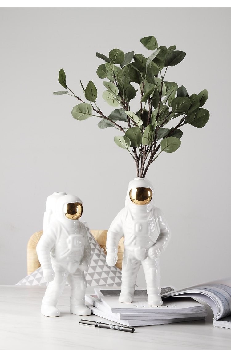 Astronaut flower vase decorative planter shown in use